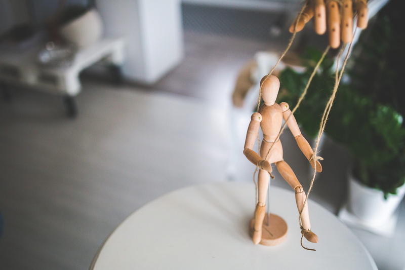 wooden, model, human body part, selective focus, occupation, puppet, freshness, human hand, wooden mannequin, focus on foreground, pressure, hanging, close-up