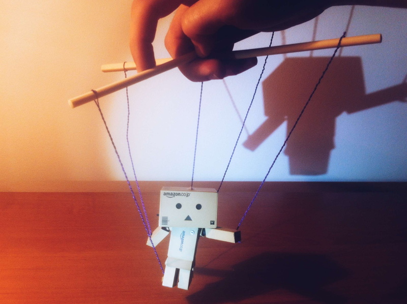 holding, marionette, puppet, indoors, playing, close-up, representation, mobilephotography, shadow, human finger, unrecognizable person, 2K, leisure activity
