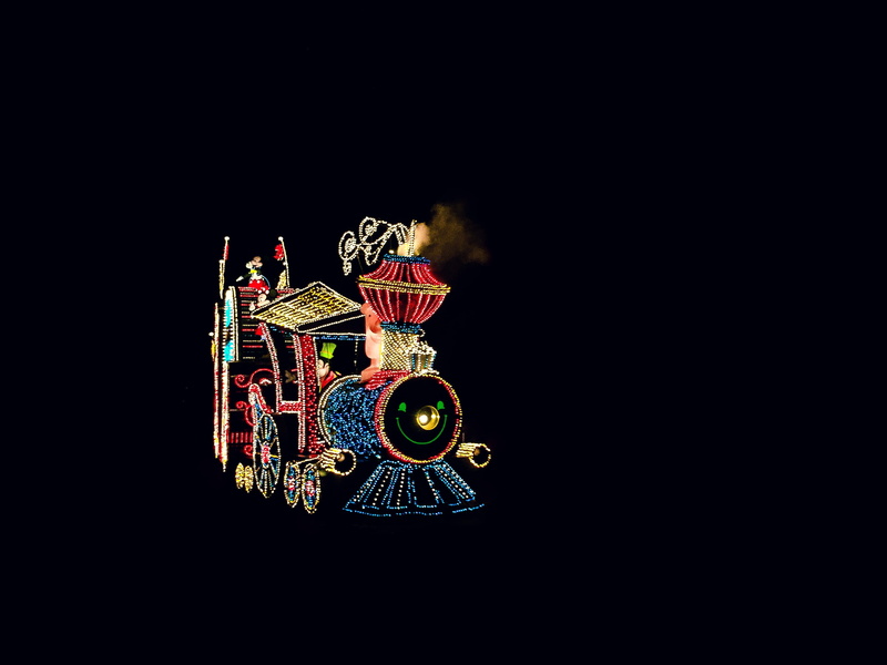 design, craft, disneyland, train, happy, multi colored, celebration, mickey, indoors, representation, still life, black background, lights, illuminated