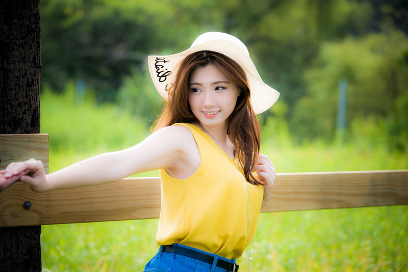 day, hair, hairstyle, standing, focus on foreground, portrait, leisure activity, wood - material, tree, outdoors, fashion, real people, lifestyles, beautiful woman