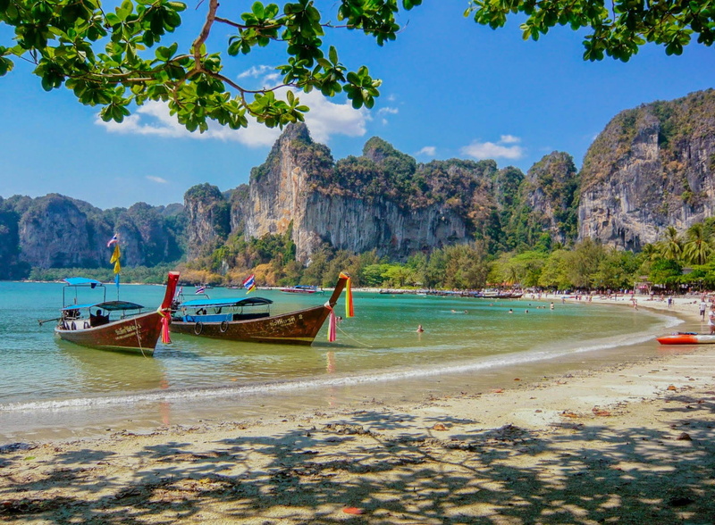 mode of transportation, tranquil scene, mountain, beauty in nature, plant, outdoors, anchored, boats, landscape, nature, mountain range, scenics - nature