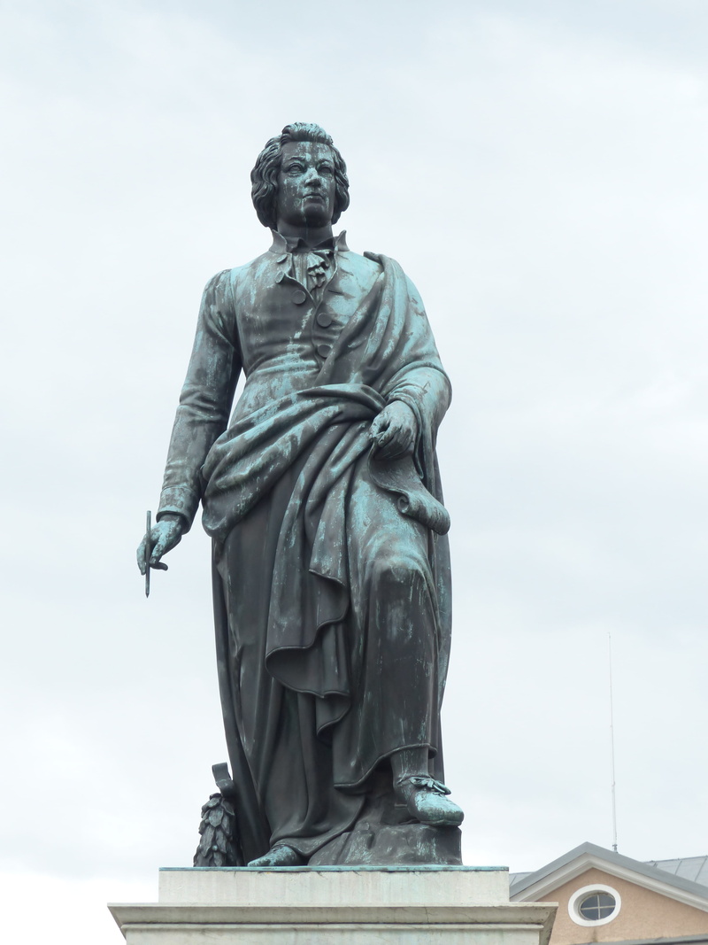 female likeness, the past, art and craft, Memorial, male likeness, craft, mozart memorial, bronze statue, low angle view, austria, Mozart, travel destinations