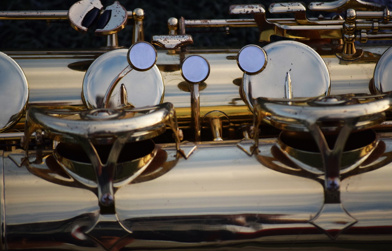 no people, musical instruments, focus on foreground, jazz, outdoors, instrument, brass instrument, trumpet, steampunk, celebration, brass, sax, saxophone