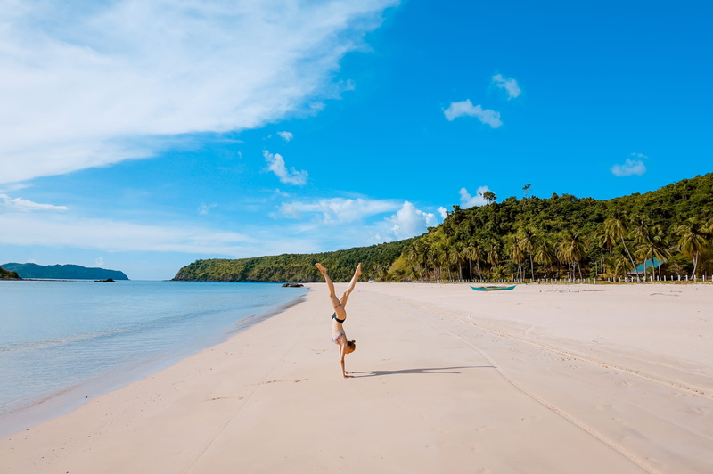 sea, nature, full length, beauty in nature, coast, one person, land, human arm, cloud - sky, plant, scenics - nature, girl, water, tumbling, arms raised