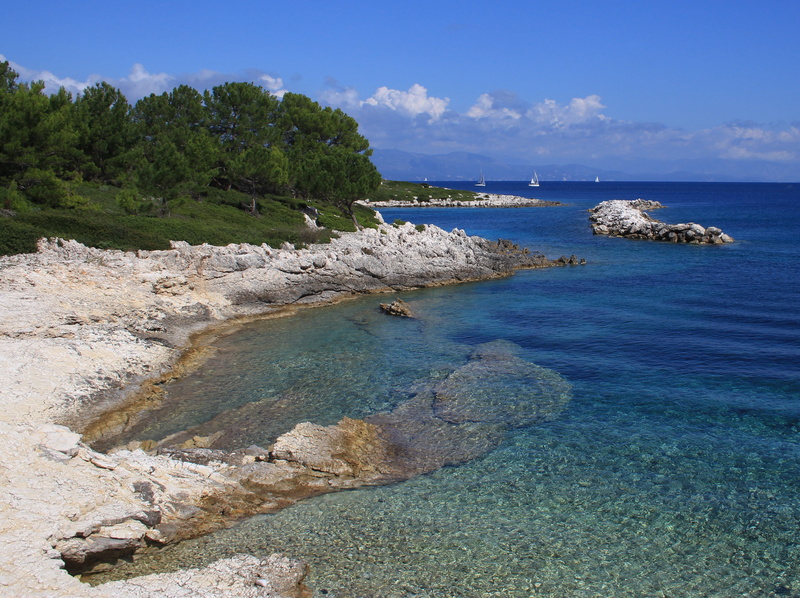 tree, sky, beauty in nature, plant, cloud - sky, beach, greek, horizon over water, sea, seascape, land, rock, tranquility, coast, mediterranean, blue, greek islands
