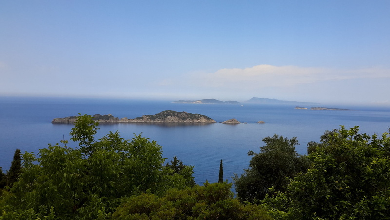 island, non-urban scene, tranquil scene, summer, tranquility, blue, horizon over water, travel, sky, scenics - nature, horizon, no people, outdoors, sea