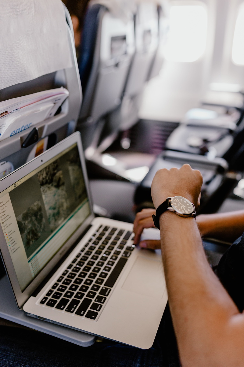 mode of transportation, real people, entrepreneur, inside, notebook, connection, adult, table, staircase, wireless technology, macbook, technology, keyboard