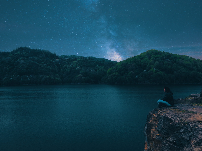 person, sitting, Dark Sky, one person, night sky, peak, starry night, scenic, astronomy, colors, nature, evening, lake, star - space, starry sky, water