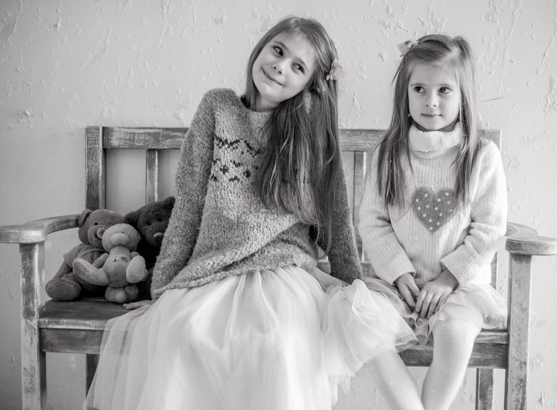 indoors, bench, two people, sibling, grayscale, togetherness, childhood, lifestyles, bears, sits, girl, the little girl, children only, looking at camera