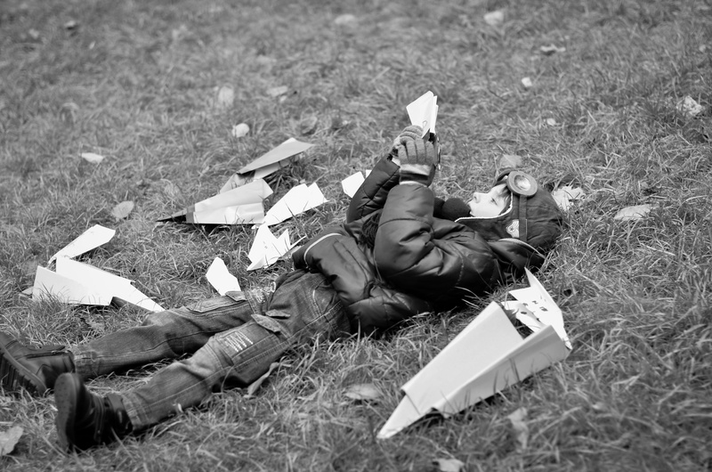 field, paper airplanes, toy, paper, boy, government, publication, men, day, lying on back, nature, book, aviator, 4K, outdoors, people, land, vintage