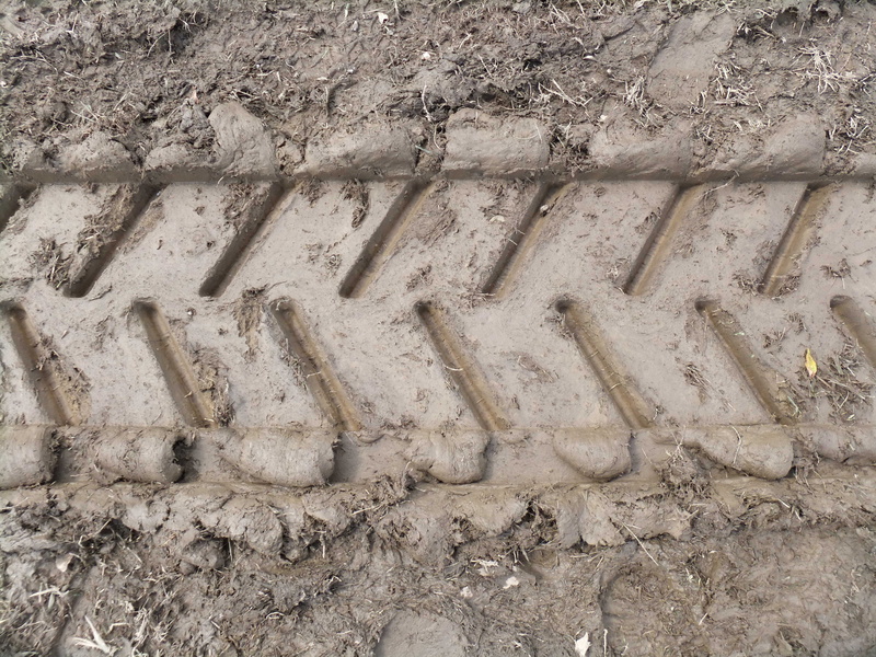 tires, sculpture, engine, day, mud, no people, traction, sand, craft, directly above, antiques, nature, rain, concrete, tracks, dirt, steam, soil, imprinted