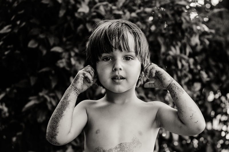 real people, lifestyle, black And White, ears, leisure activity, females, standing, grayscale, one boy only, boys, people, childhood, shirtless, day, concepts And Ideas