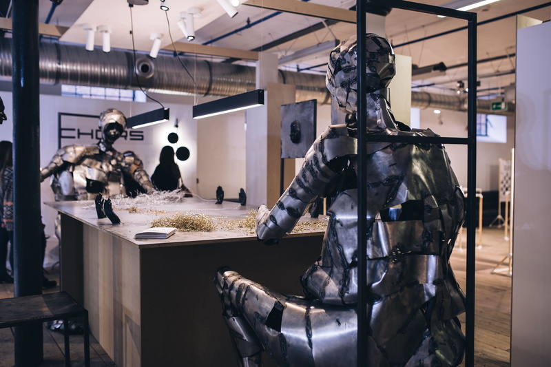 statue, table, factory, gun, 5K, military, hard, equipment, figures, indoors, technology, day, Metal, work tool, weapon, working, no people, workshop