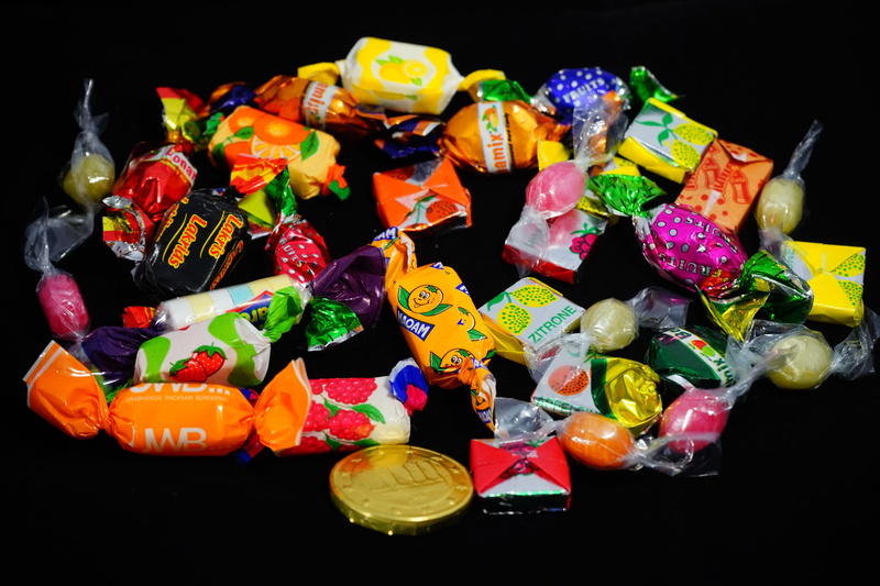 packet, chewy candy, mix, Candy, confectionery, black background, color, close-up, Sweets, large group of objects, collection, food and drink, still life