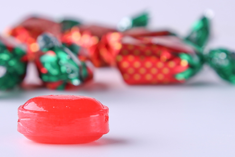 confection, dessert, focus on foreground, celebration, wrapper, icon, bonbon, close-up, toffee, group of objects, confectionery, studio shot, day, wrapped