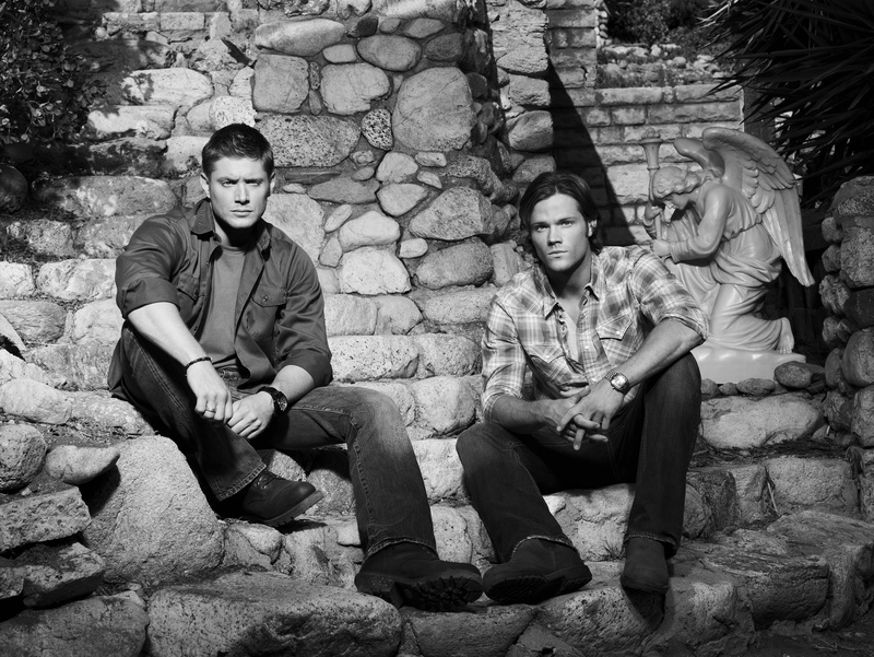 wall, togetherness, sam, women, smiling, stone wall, men, black And White, looking At Camera, solid, leisure activity, casual Clothing, portrait, two people