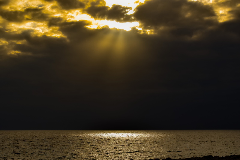 orange color, water, sunset, overcast, sunbeam, idyllic, no people, sunlight, tranquility, scenics - nature, tranquil scene, horizon over water, outdoors