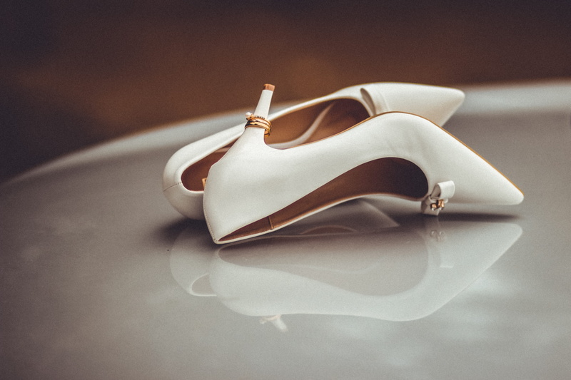 two objects, art and craft, focus on foreground, strap, day, creativity, wood - material, still life, close-up, footwear, indoors, white, page, table, selective focus