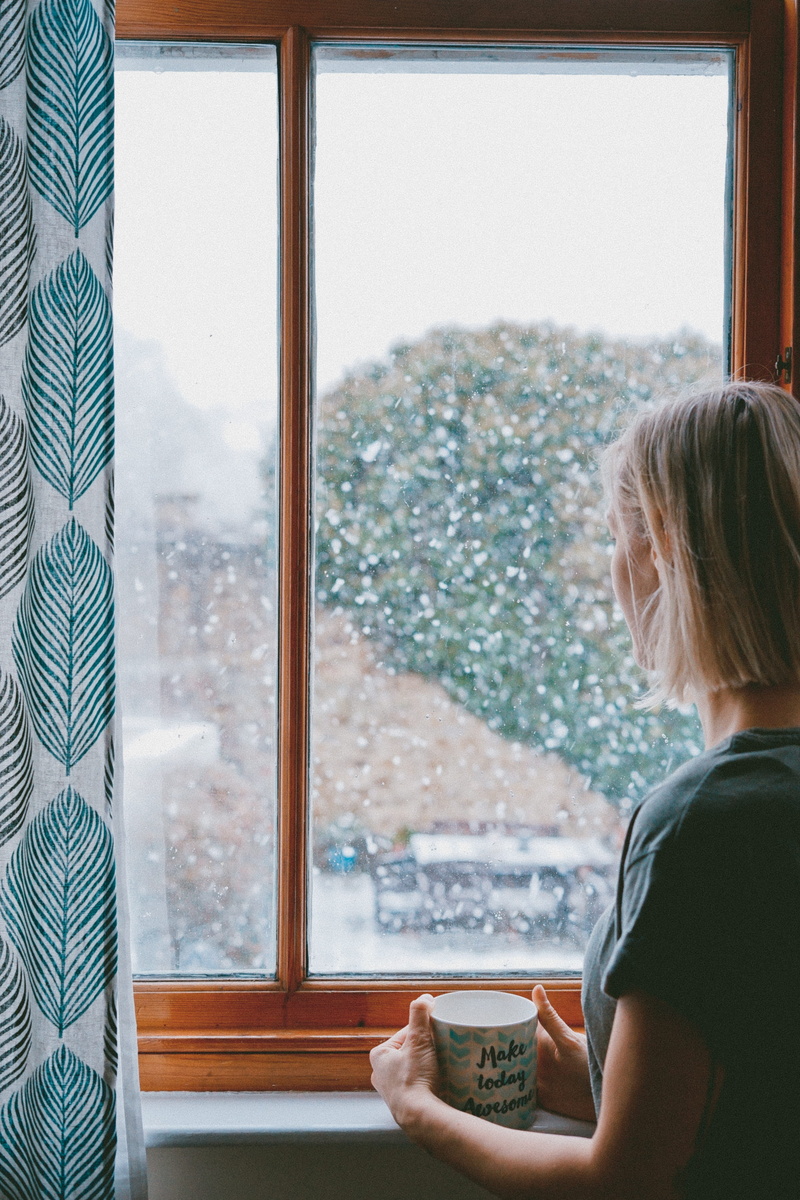 adult, women, one person, snowing, glass, cup, beside, front, casual clothing, room, looking through window, glass - material, rear view, holding, drinking