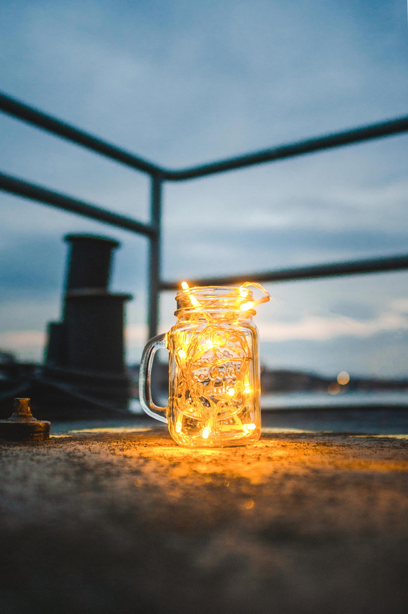 honey, day, food, animal, outdoors, invertebrate, jar, sunset, glass - material, lighting equipment, sky, still life, bottle, no people, turned, water jug