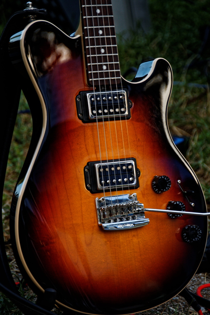 day, no people, focus on foreground, musical equipment, detail, wood, musical instrument string, music, gloss, string, soundbody, brown, veneer, guitar