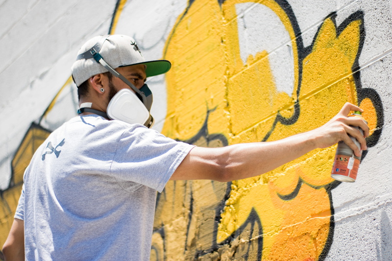 sunlight, people, outdoors, one Person, hiphop, spraying, cultures, urban Scene, shadow, art, men, street, guatemala, wall, man, yellow, grafiti, urban
