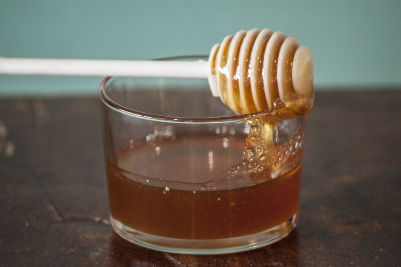 food, 4K, gold, dripping, focus on foreground, sweet, still life, close-up, food and drink, snack, jar, liquid, drink, sweetener, wood - material, household equipment
