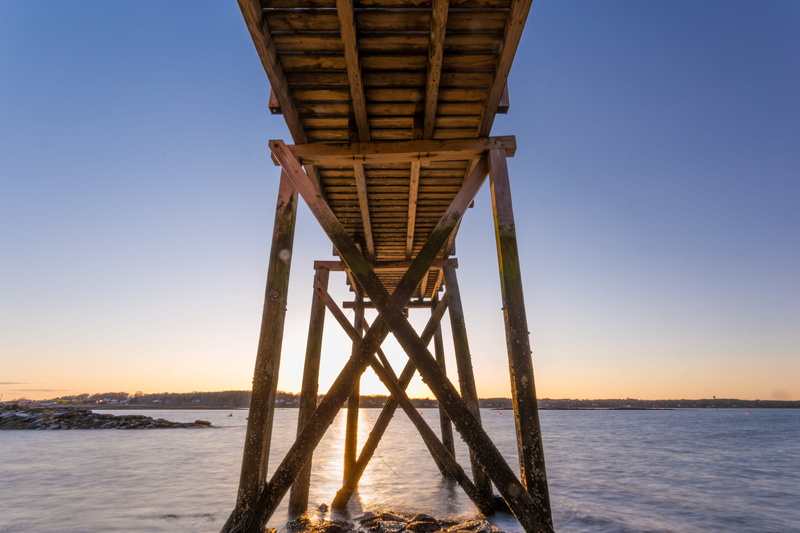 nature, built structure, sunset, beach, under, angle, 5K, underneath, structure, sky, wooden, light, tranquil scene, wood - material, no people, beauty in nature
