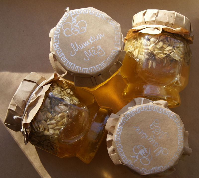 no people, text, high angle view, container, western script, beekeeping, table, yellow, group of objects, collects nectar, finance, business, comfort, still life