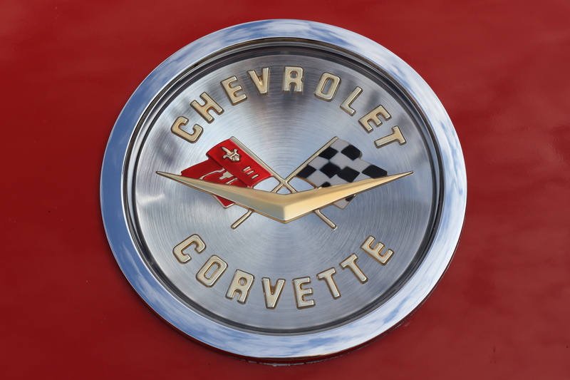 no people, luxury, chrome, indoors, symbol, finance, communication, car, ornament, western script, hood, red, number, business, automobile, close-up, geometric shape
