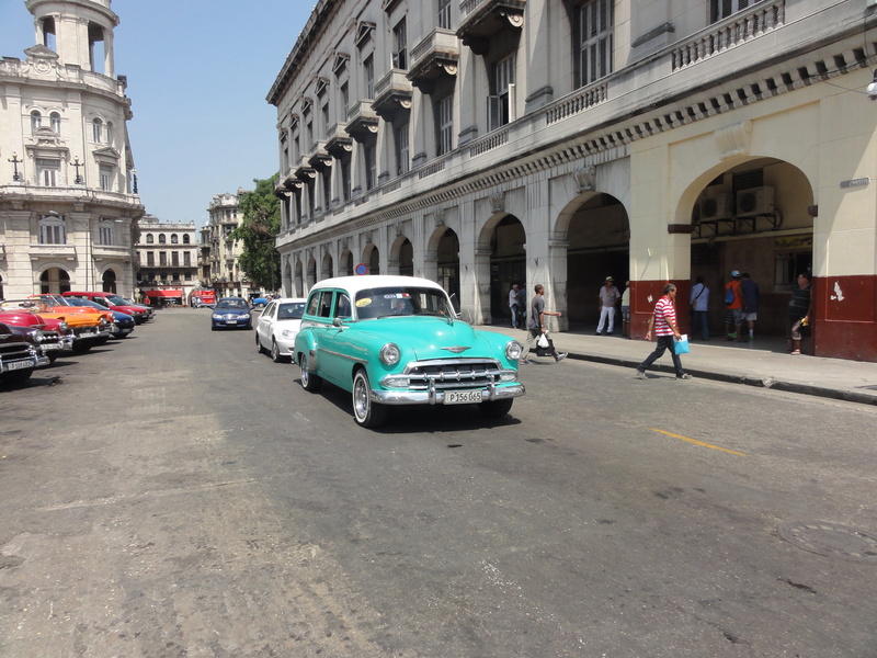 real people, outdoors, land vehicle, built structure, cuba, car, architectural column, building exterior, 2015, people, day, havana, men, mode of transportation