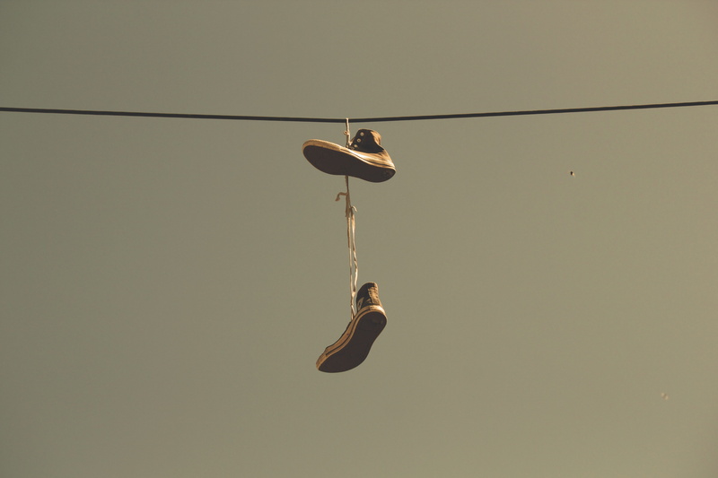 5K, no people, nature, pair, studio shot, low angle view, sky, metal, clear sky, hanging, shoes, rope, laces, city, connection, outdoors, copy space, close-up