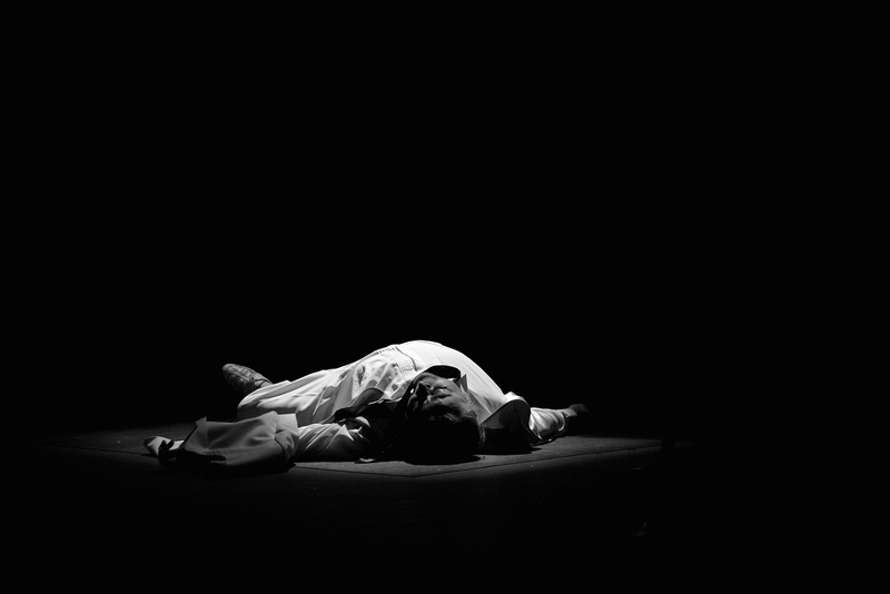 2K, one person, sleeping, black and white, social issues, lying on back, young adult, man, lying down, adults only, copy space, gray, one woman only, full length