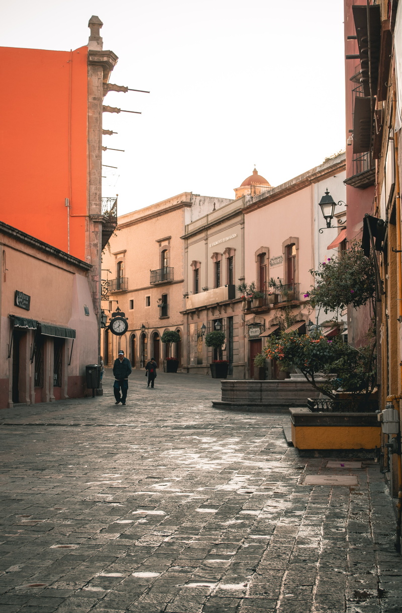 outdoors, building, colors, the way forward, city, architecture, incidental people, transportation, clear sky, footpath, tourism, street, paving stone
