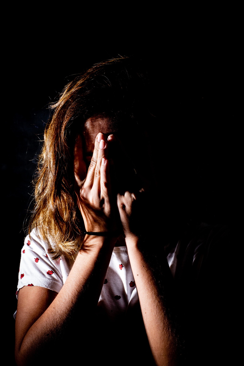 dark, person, headshot, young women, crowd, women, indoors, young adult, human, mood, hair, front view, 5K, people, emotion, back, black background, human face