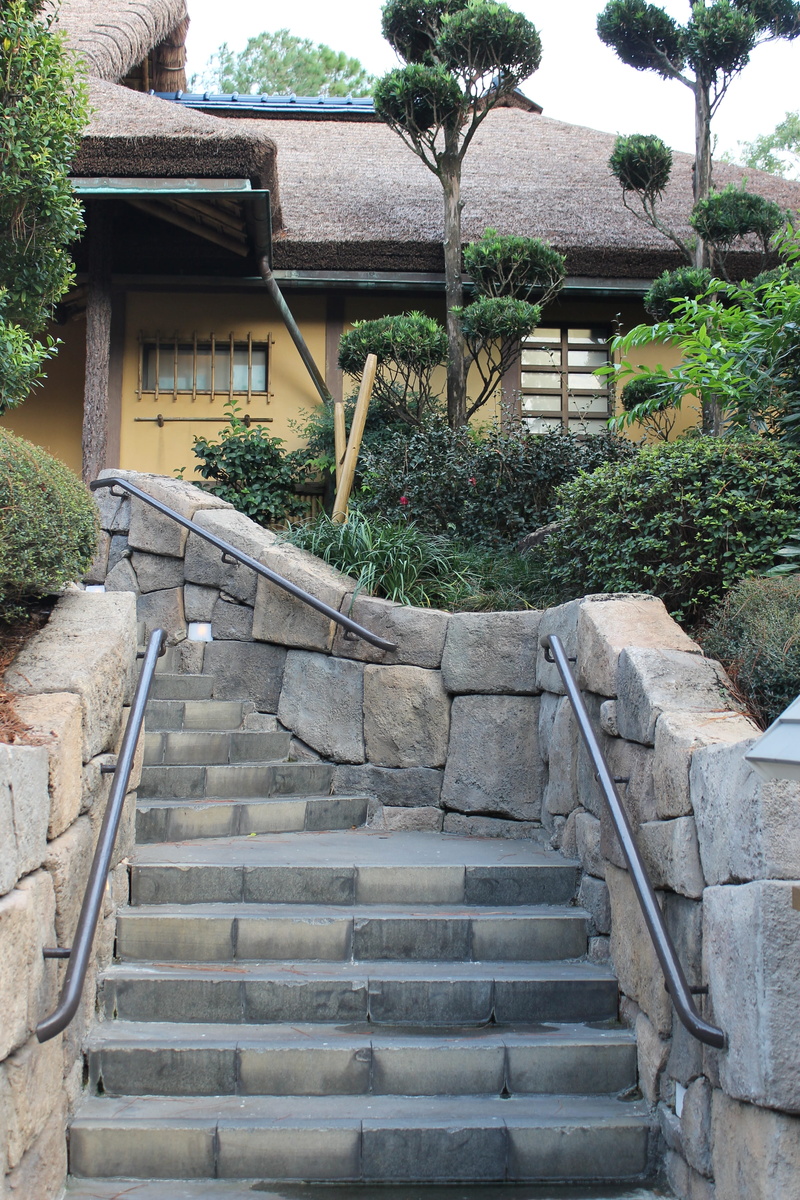 architecture, roof, outdoors, steps and staircases, growth, solid, staircase, building exterior, railing, no people, plant, roof tile, nature, day, direction
