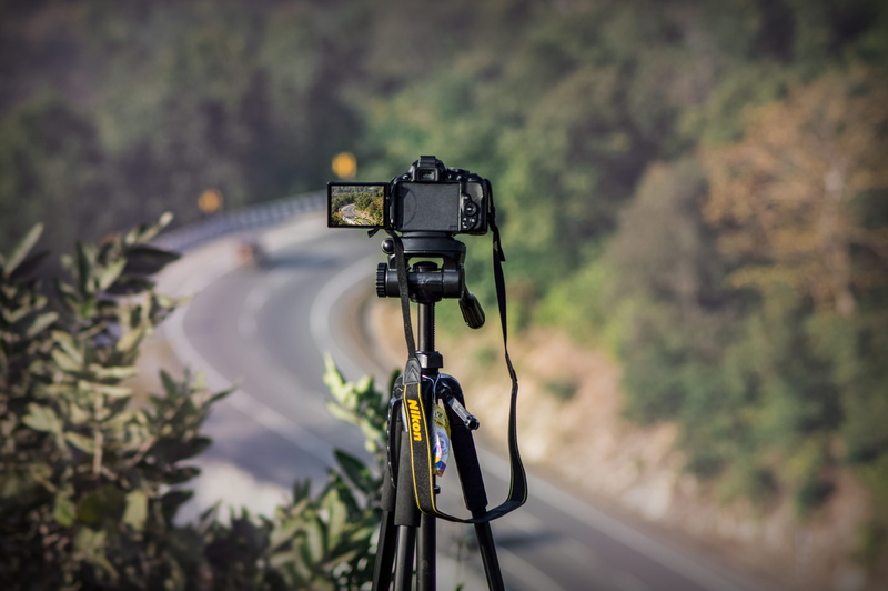 photography themes, tripod, photographic equipment, nikon, plant, highway, landscape, activity, tree, focus on foreground, no people, camera - photographic equipment