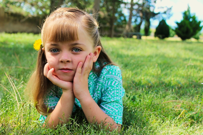 joy flowers, looking at camera, park, leisure activity, females, happiness, beautiful, fun, outside, women, innocence, summer, hand, real people, lifestyles