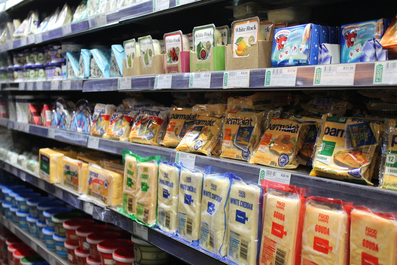 processed, grocery store, store, no people, bottle, variation, label, food and drink, retail, in a row, products, gondola, business, drink, shelf, refrigerator