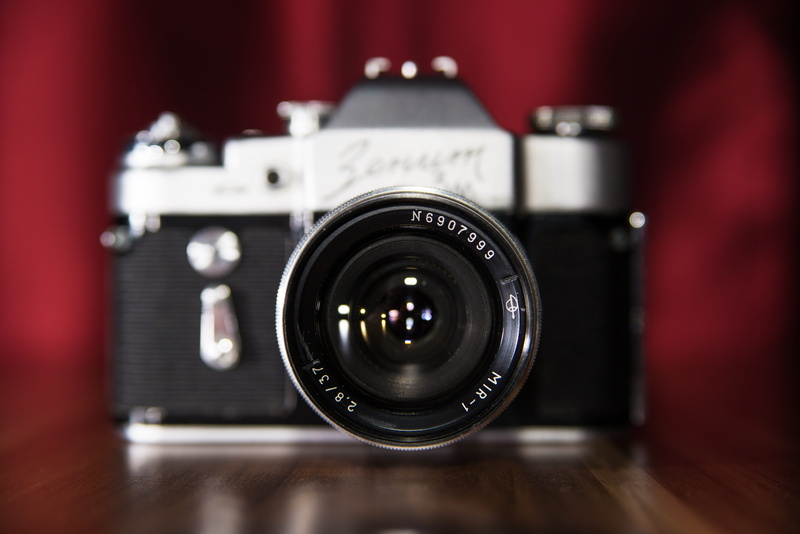 old, 5K, slr camera, film, arts culture and entertainment, indoors, front view, single object, close-up, retro, zenith, silver colored, optics, photography