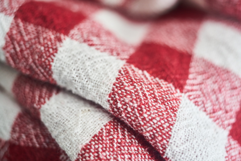 fabric, detail, pore, art and craft, 8K, plaid, selective focus, wool, white, horizontal, indoors, red, pattern, pink, winter, macro, material, towel