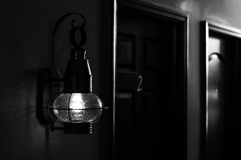 shadow, ceiling, transparent, close-up, architecture, still life, indoors, lamp, domestic kitchen, dark, room, monochrome, sconce, building, metal, grayscale