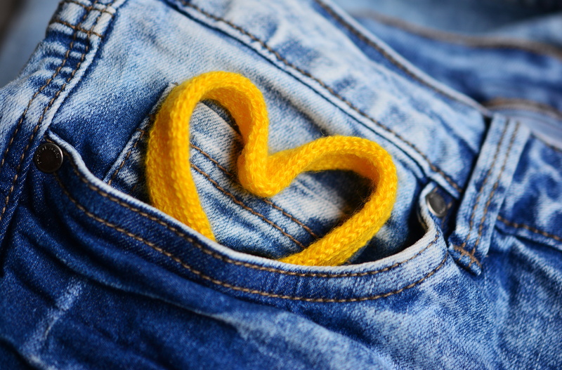 yellow heart, structure, ornament, denim, jeans, clothing, casual clothing, lifestyles, midsection, shape, communication, greeting, love, textile blue
