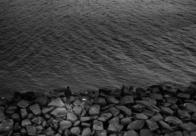 4K, tranquil scene, greyscale, people, body, sea, beauty in nature, tranquility, groyne, near, no people, high angle view, standing, stone, man, rock