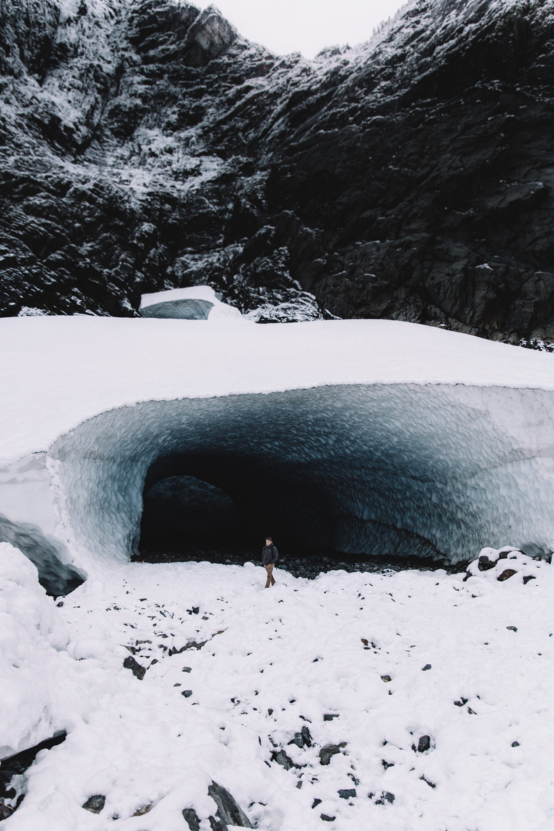 cave, mountain, snow, non-urban scene, snowcapped, glacier cave, travel, glacier, no people, covering, ice cave, flowing water, blue, tree, person, pacific northwest