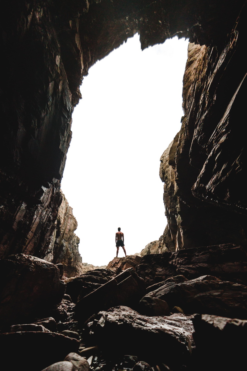 rocky cave, sport, journey, people, climbing, tourist, mountain, women, scenics, standing, cliff, man, exploration, freedom, sea, nature, wildlife, backpacker