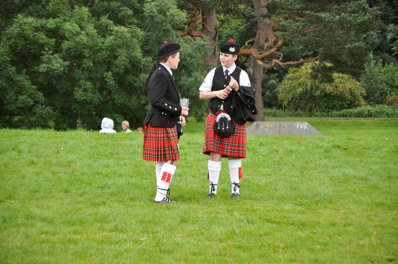 men, plant, tree, green color, traditional clothing, grass, standing, tartan, united kingdom, clothing, entertainment, leisure activity, people, costume
