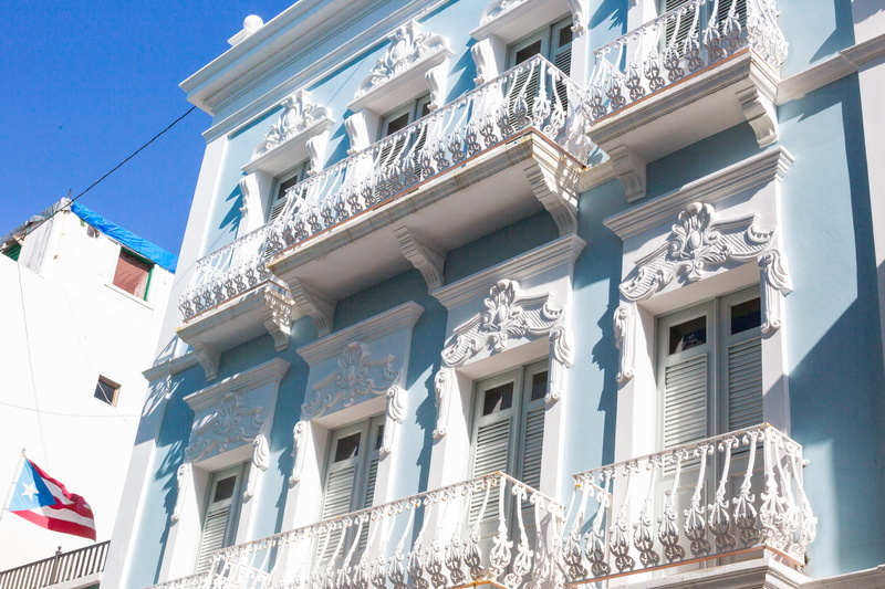 building, blue, spanish architecture, flag, residential district, day, railing, old san juan, patriotism, puerto rico, window, building exterior, nature