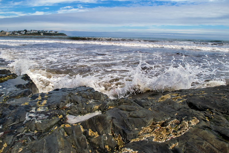 flowing water, nature, cloud - sky, rocky coastline, breaking, motion, surfing, rock - object, beach, beauty in nature, landscape, water, sea, power in nature