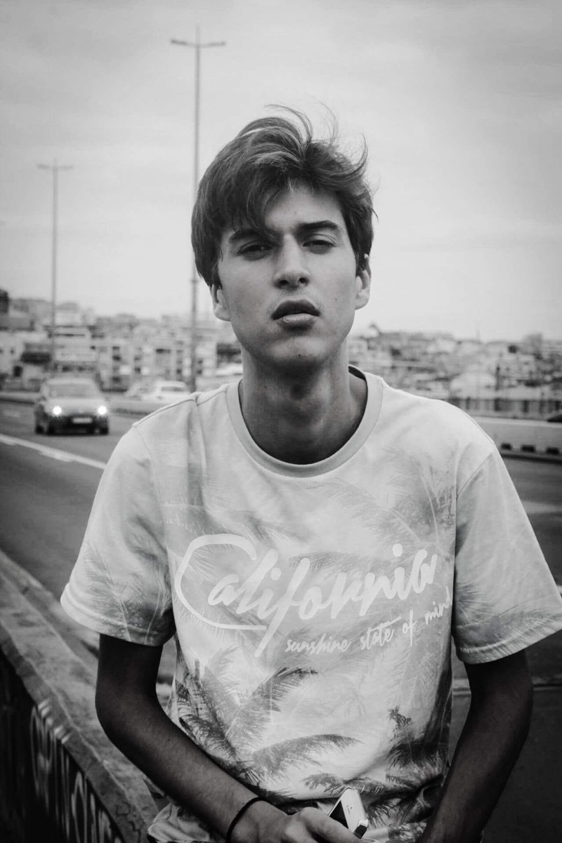 outfit, standing, young men, male, black-and-white, day, young adult, 1080P, blur, waist up, one person, leisure activity, sky, wear, model, pose, vehicles